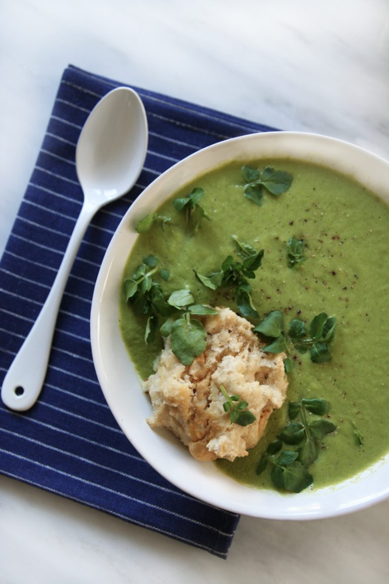 Bright warm pea soup with gluten free vegan cheddar biscuits with watercress