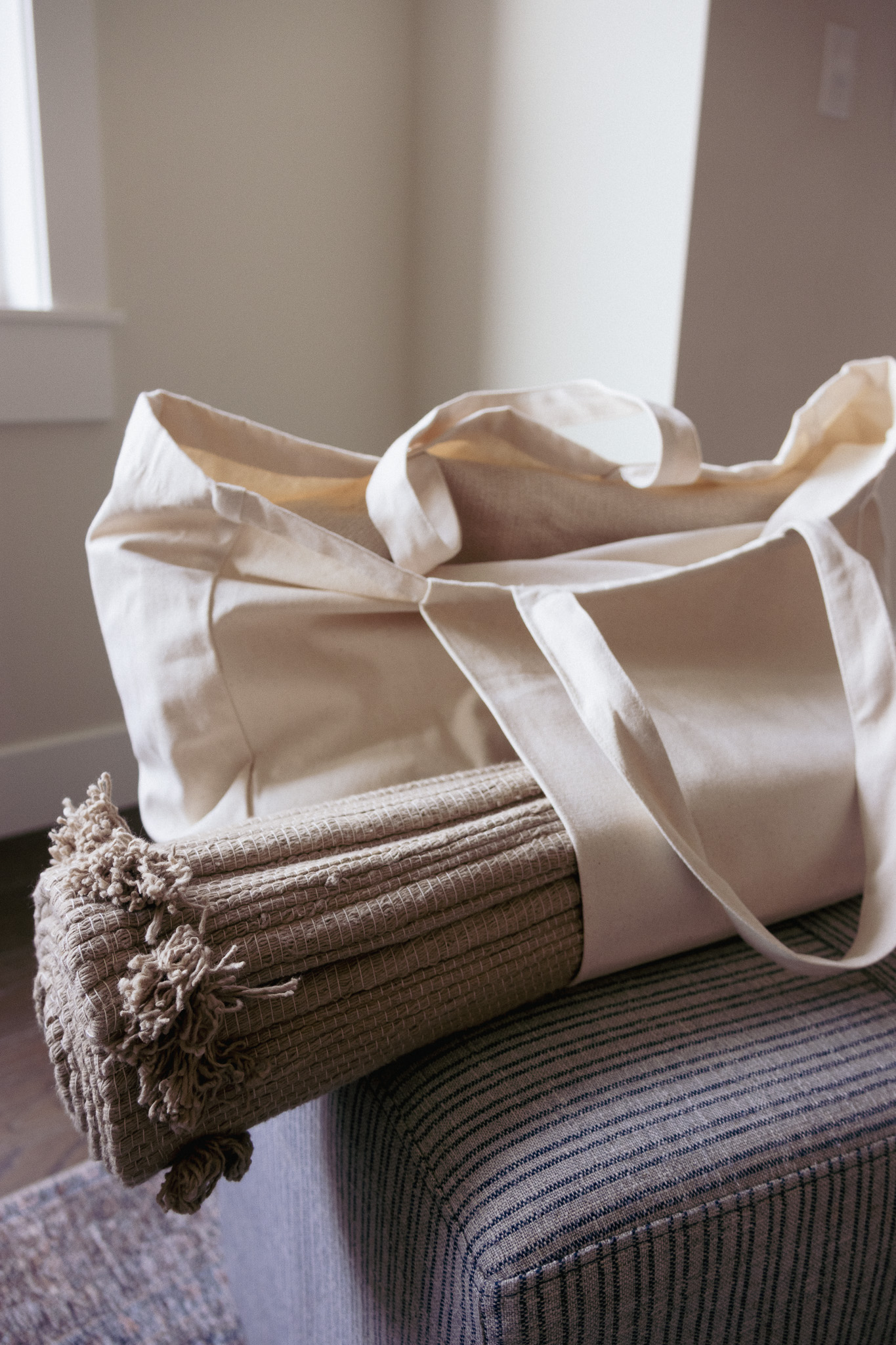 Organic cotton yoga tote bag carrying a rolled yoga mat Willa Wellness